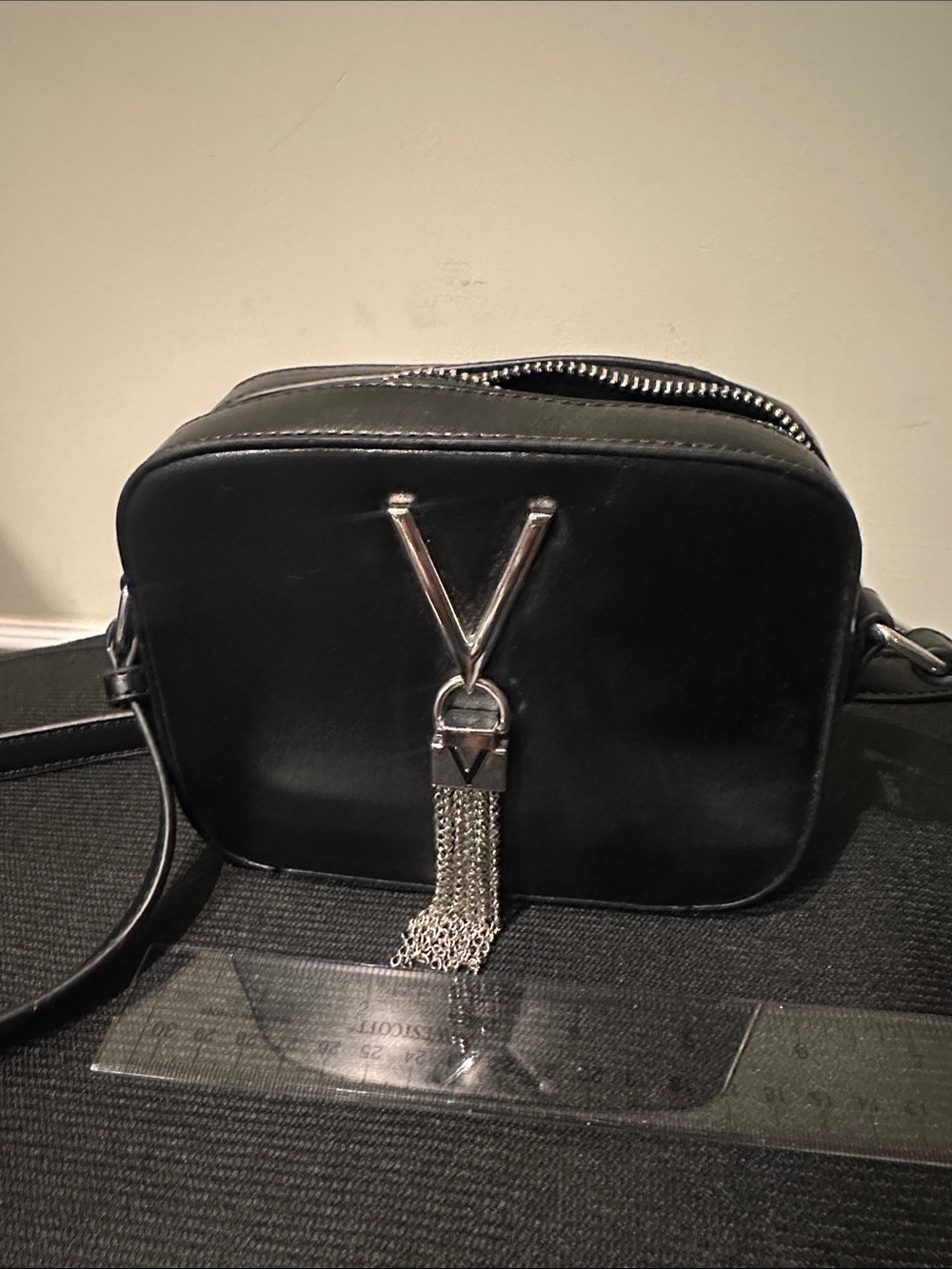 Mario Valentino Black Leather Crossbody Bag with Silver Tassel Accent